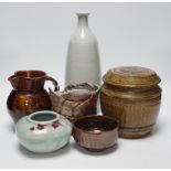 Studio ceramics to include a St. Ives moulded jug and an ash glazed jar and cover marked 'MD' etc.