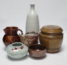 Studio ceramics to include a St. Ives moulded jug and an ash glazed jar and cover marked 'MD' etc.