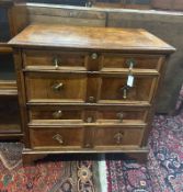 A late 17th century / early 18th century walnut and oak two part chest of drawers width 95cm,