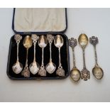 Assorted plated flatware and three silver commemorative spoons