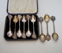 Assorted plated flatware and three silver commemorative spoons