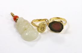 A yellow metal and coral bead mounted carved jade pendant, overall 49mm, a 1970's 18ct gold and