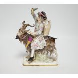 A Meissen group of Count von Bruhl’s tailor riding a goat, 19th century, 22cms high