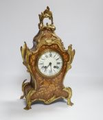 A French gilt metal mounted rosewood mantel clock. 40cm