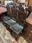 A set of six late 19th century Flemish carved oak dining chairs