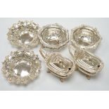 Two pairs of early 20th century pierced silver bonbon dishes, largest diameter 12.3cm and a pair