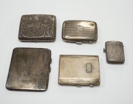 Three assorted silver cigarette cases including Art Deco, largest 10.1cm, a silver vesta case and