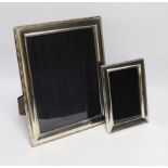 Two modern silver mounted rectangular photograph frames, largest 30.5cm.