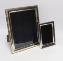 Two modern silver mounted rectangular photograph frames, largest 30.5cm.