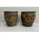 A near pair of Chinese style glazed earthenware garden planters, larger diameter 50cm, height 50cm