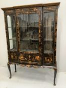 An early 20th century chinoiserie lacquer breakfront display cabinet, width 123cm, depth 40cm,