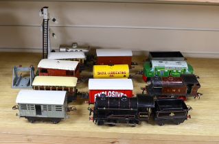 Thirteen Hornby 0 gauge tinplate items including; a clockwork 0-4-0 tender loco, 60199, a 20v