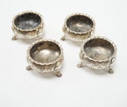 A set of four George II silver bun salts, William Gilchrist, Edinburgh, 1755?, diameter 64mm, 11.