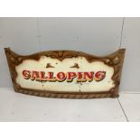 A set of three vintage printed metal 'galloping horse carousel’ fairground boards, each width 170cm,