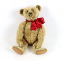 An early Steiff, c.1908, 40cm, no button, in very good condition, replaced paw pads