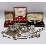 Sundry silver wares including a cigarette box and case, cased condiment set, cased pair of