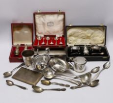 Sundry silver wares including a cigarette box and case, cased condiment set, cased pair of