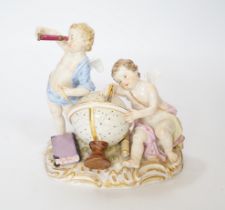 A Meissen group of putti and a celestial globe, emblematic of astronomy, numbered 2460