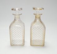 A pair of early 19th century Bohemian gilded glass decanters, 19.cm high