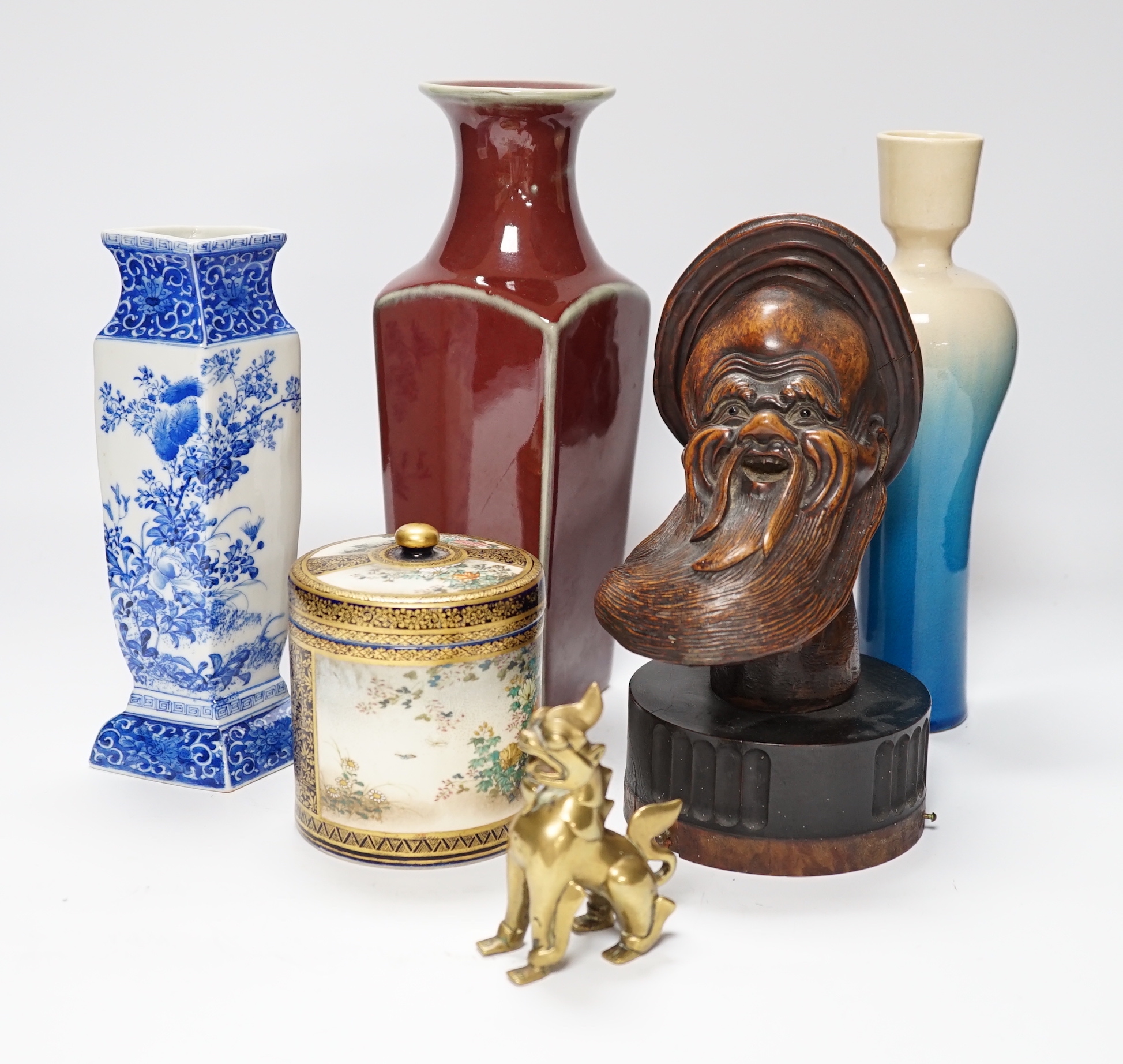 A Chinese sang-de-boeuf vase, a hongmu head, a Japanese Satsuma jar, a blue and white vase, and a - Image 10 of 18