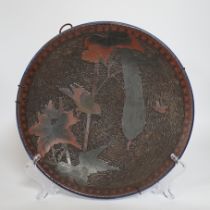 A Japanese porcelain and cloisonné enamel dish, 27.5cm diameter