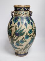 A Persian fritware vase in Iznik style, 40cm high