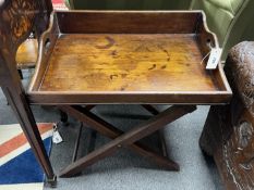 A small Victorian rectangular mahogany butler's tray on folding stand, width 58cm, depth 42cm,