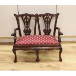 A miniature Chippendale style chair back settee, 51.5cm high