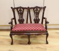 A miniature Chippendale style chair back settee, 51.5cm high