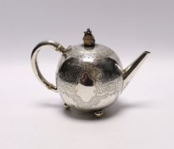 A late Victorian silver bullet shaped teapot, by Atkin Brothers, Sheffield, 1888, with engraved