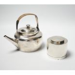 A late Victorian silver tea kettle with stand and rattan handle and a silver warming caddy/burner,