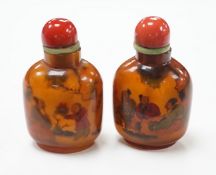 Two Chinese glass snuff bottles, internally painted with figures, 8cm high