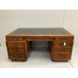 A mid century mahogany pedestal desk, width 162cm, depth 93cm, height 76cm