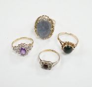 Two 9ct and gem set rings including cabochon bloodstone, a 14k and opal? doublet set ring and one