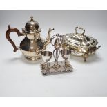 Silver plated items including two wine coasters, tureens and egg cup stand, largest 24cm high