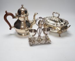 Silver plated items including two wine coasters, tureens and egg cup stand, largest 24cm high