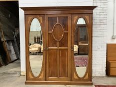 An Edwardian satinwood banded and patera inlaid mahogany triple compactum wardrobe, width 203cm,