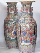 A pair of large 19th century Chinese famille rose vases, 64cm high