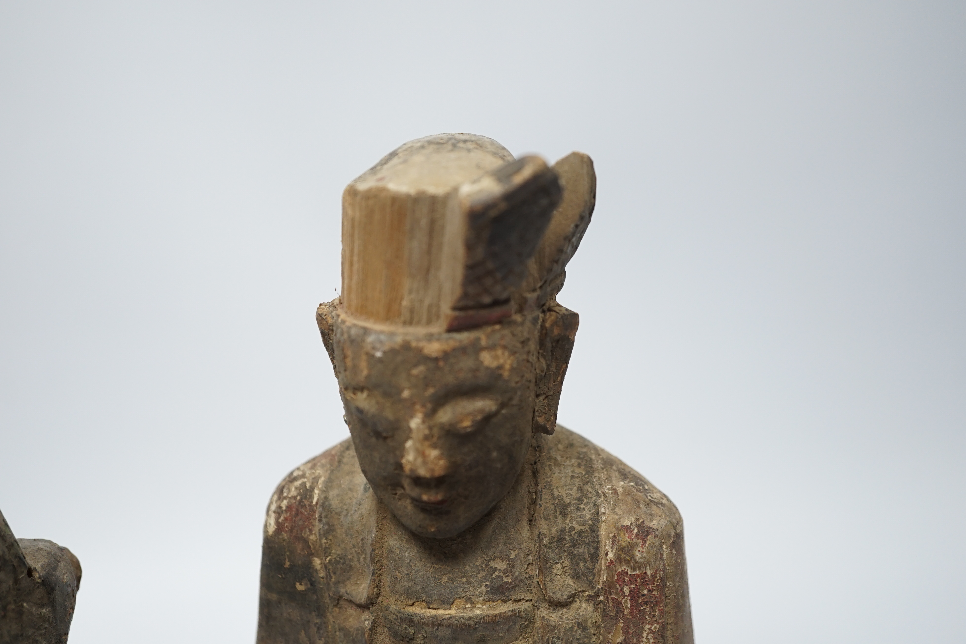 Two Chinese or Southeast Asian carved wood figures of seated immortals, and seven small wood stands, - Image 4 of 6