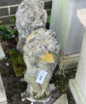 A pair of reconstituted stone seated lion garden ornaments, height 52cm