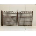 A pair of wrought iron gates, total length 234cm, height 129cm