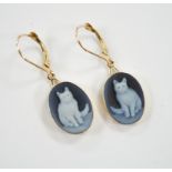 A pair of 585 yellow metal and cameo glass? set oval drop earrings, each decorated with a seated