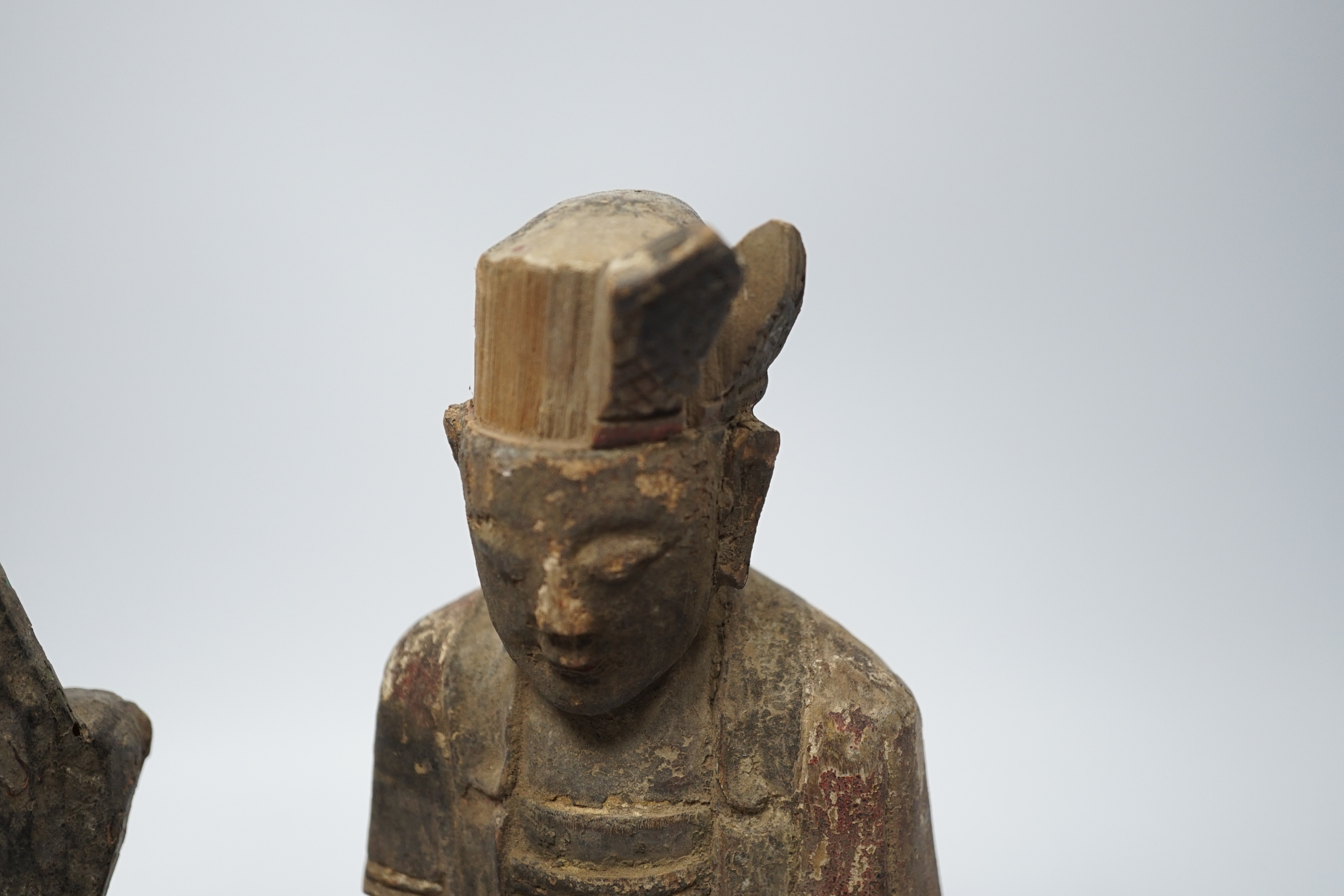 Two Chinese or Southeast Asian carved wood figures of seated immortals, and seven small wood stands, - Image 5 of 6