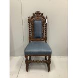 A Victorian Carolean style carved oak dining chair, height 112cm