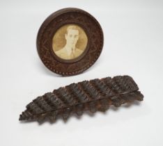 A Victorian carved wood photo frame and fern leaf dish, leaf dish 25c long