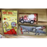 Three boxed 1960s battery operated plastic toys including a Rosho Toy tinplate and plastic airliner,