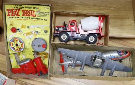 Three boxed 1960s battery operated plastic toys including a Rosho Toy tinplate and plastic airliner,