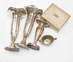 A pair of George V silver mounted posy vases, Birmingham, 1919, 17.3cm, a similar smaller vase, a