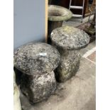 Two natural stone staddle stones, larger diameter 47cm, height 74cm