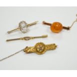 A 750 yellow metal and single stone diamond set bar brooch, 53mm, gross weight 2 grams and three